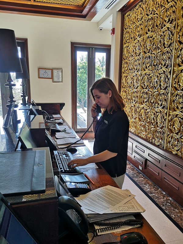 Bianka working on the front desk at a Marriott hotel placement in Thailand